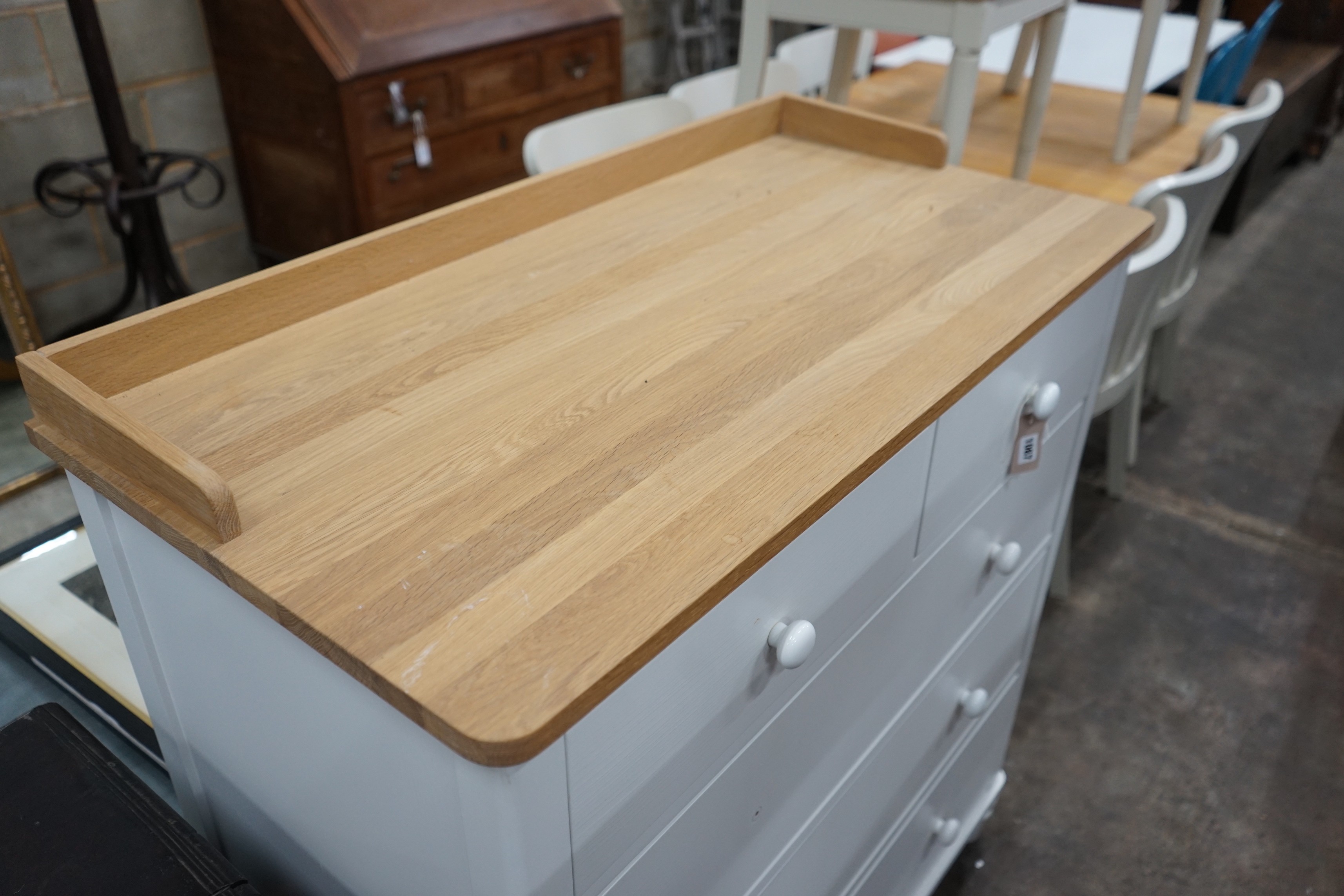 A modern John Lewis part painted chest of drawers width 101cms, depth 51cms, height 111cms.